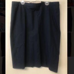 Dark navy Jcrew pencil skirt with small slit on back. Size 12 tall.